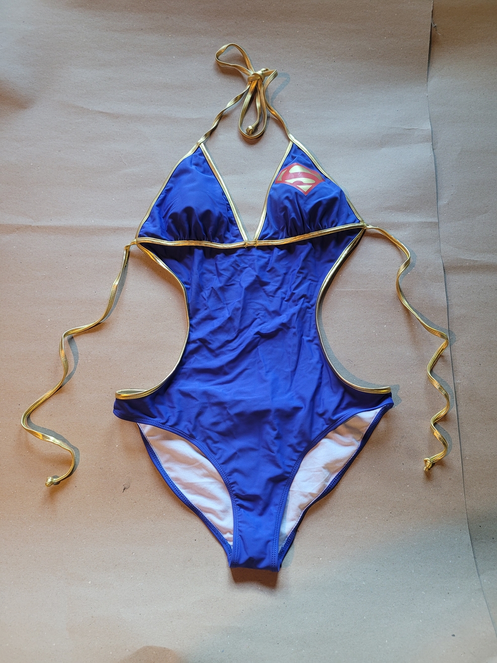 Supergirl-Inspired Blue One-Piece Swimsuit with Gold Trim
